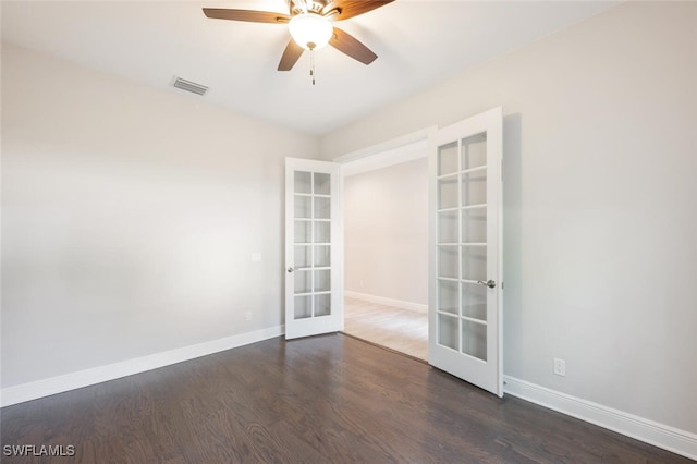 unfurnished room featuring ceiling fan, hardwood / wood-style floors, and french doors