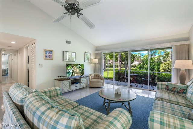 tiled living room with plenty of natural light, high vaulted ceiling, and ceiling fan