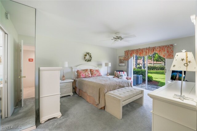 bedroom featuring light carpet, access to exterior, and ceiling fan