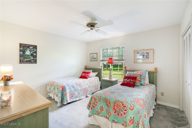 bedroom featuring carpet floors, a closet, and ceiling fan