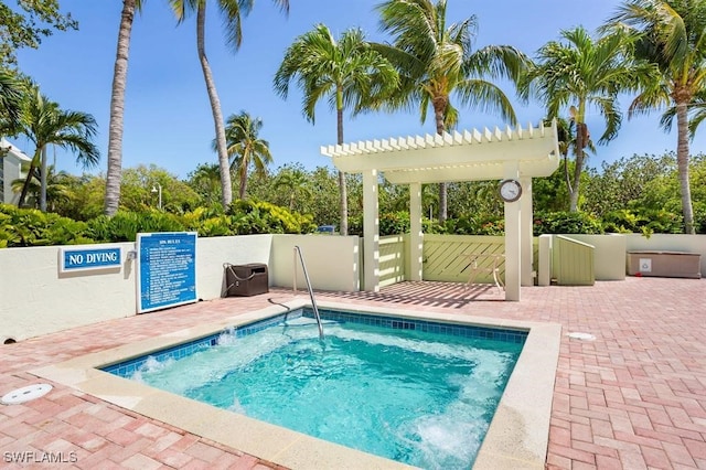 view of pool with a patio area and a pergola