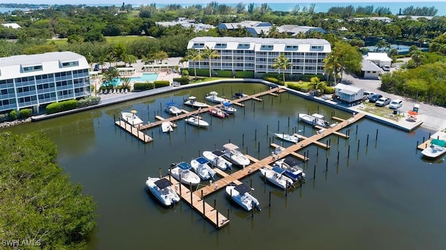 drone / aerial view with a water view