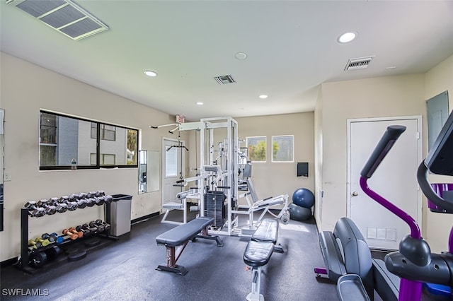 exercise room featuring visible vents and recessed lighting