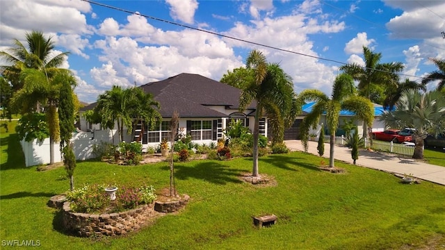 view of front facade with a front lawn