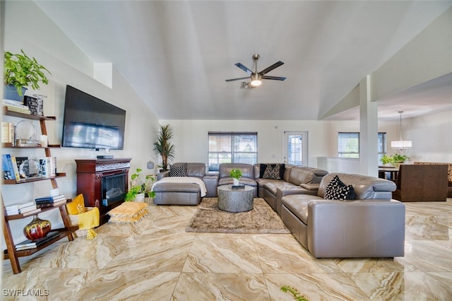 living room with lofted ceiling and ceiling fan