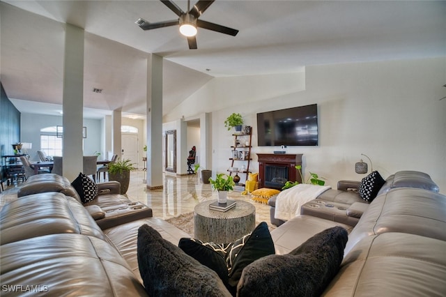 living room featuring lofted ceiling and ceiling fan