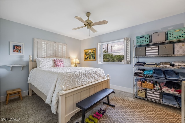 bedroom featuring brick floor, ceiling fan, and baseboards