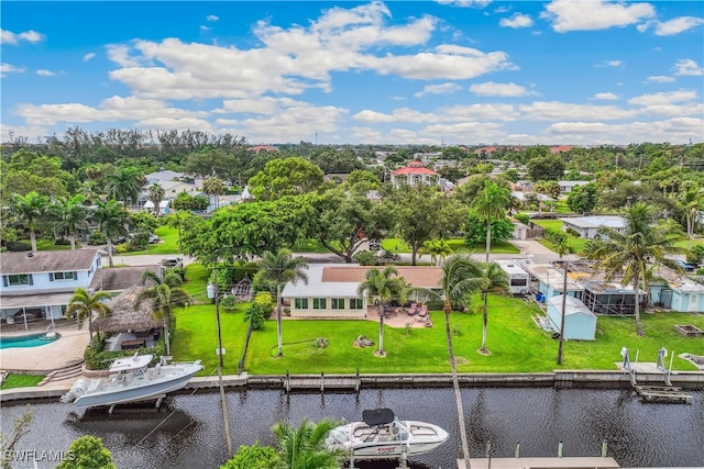 bird's eye view featuring a water view and a residential view