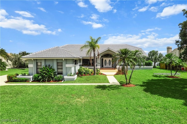 view of front of house with a front lawn