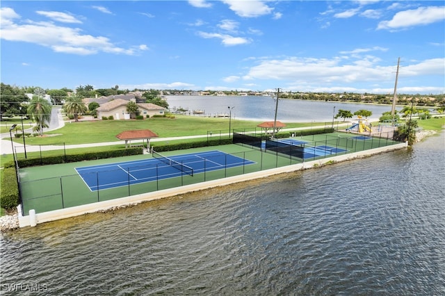 exterior space with a water view