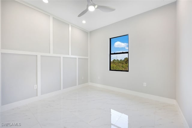 2802 63rd St W, Lehigh Acres, FL 33971 - unfurnished room featuring marble finish flooring, baseboards, ceiling fan, and recessed lighting