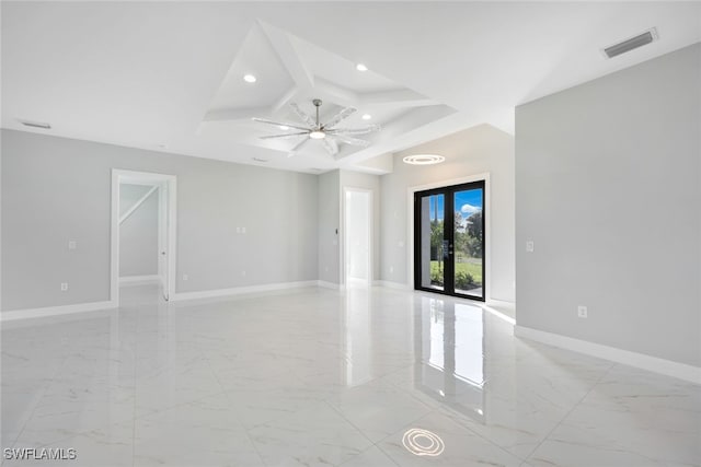 unfurnished room featuring french doors, coffered ceiling, and ceiling fan