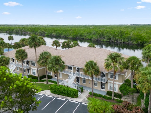 drone / aerial view with a water view