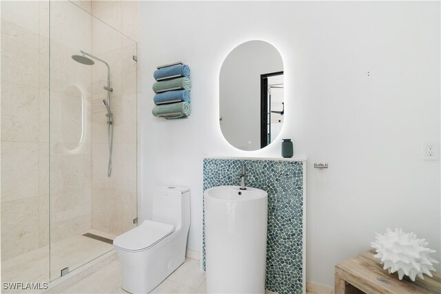 bathroom with walk in shower, tile patterned flooring, and toilet