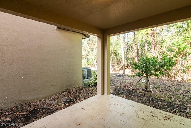 view of patio with central AC