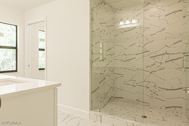 bathroom with vanity and an enclosed shower