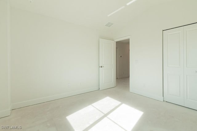 unfurnished bedroom with a closet