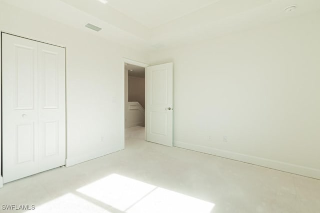 unfurnished bedroom featuring a closet