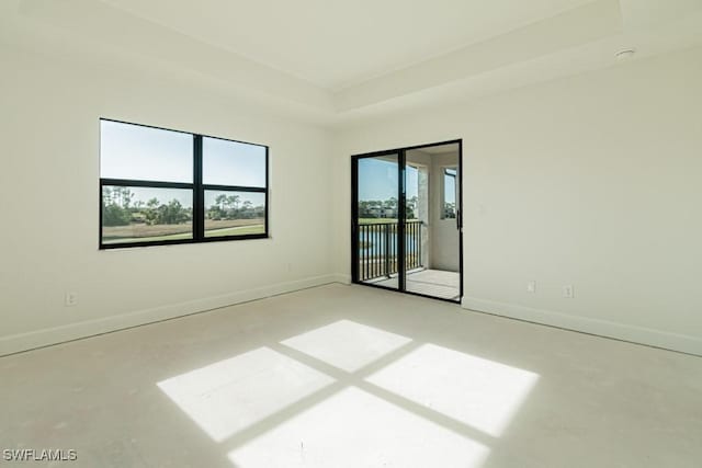 unfurnished room featuring a healthy amount of sunlight