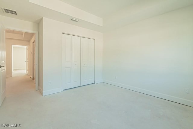 unfurnished bedroom with a closet