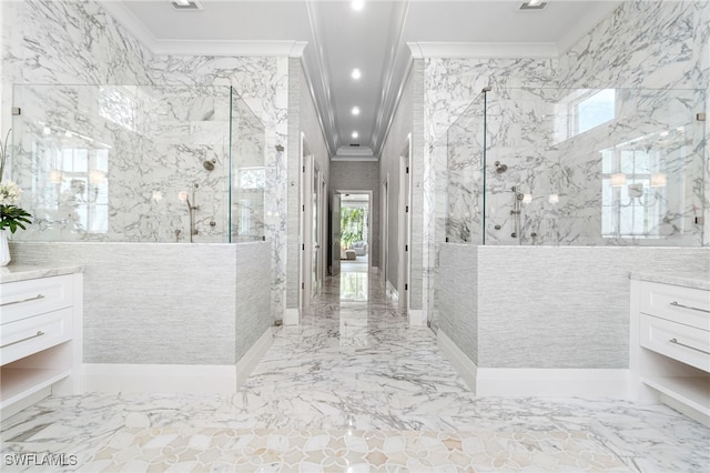 bathroom featuring tiled shower, a wealth of natural light, and ornamental molding