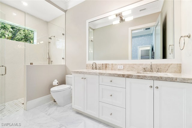 bathroom featuring vanity, toilet, and walk in shower