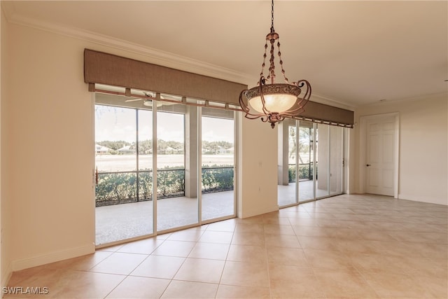 unfurnished room featuring light tile patterned flooring and crown molding