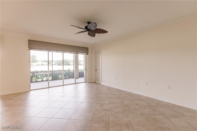 unfurnished room with crown molding, a ceiling fan, light tile patterned floors, and baseboards