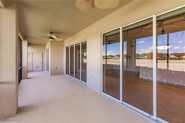 view of patio / terrace with ceiling fan