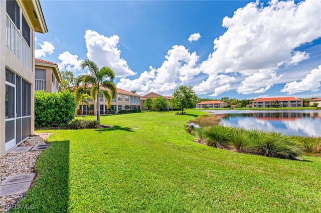 view of yard with a water view