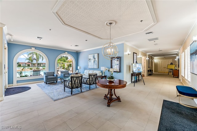 interior space with a chandelier and ornamental molding