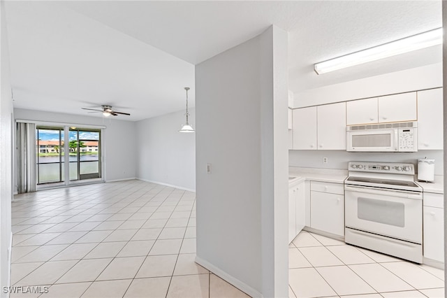 kitchen featuring white cabinetry, white appliances, light tile patterned floors, pendant lighting, and ceiling fan