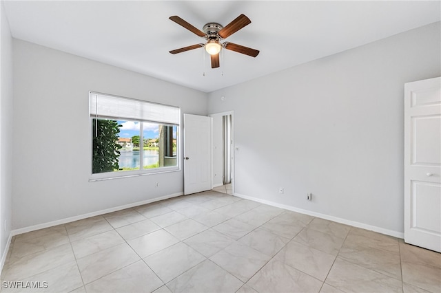 empty room featuring ceiling fan