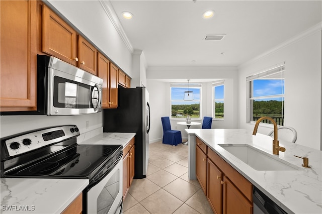 kitchen with ornamental molding, appliances with stainless steel finishes, light stone countertops, light tile patterned floors, and sink