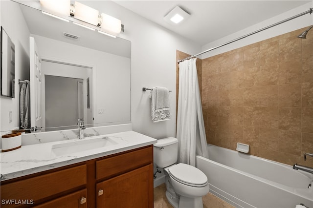 full bathroom featuring shower / bath combination with curtain, toilet, vanity, and tile patterned floors