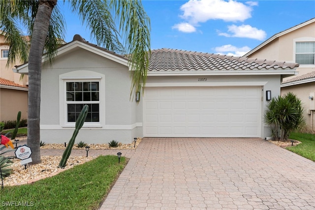 view of front of property featuring a garage