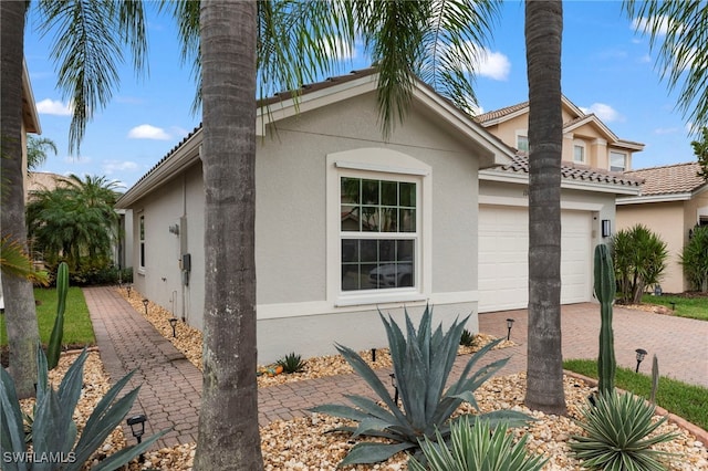 view of front of home featuring a garage