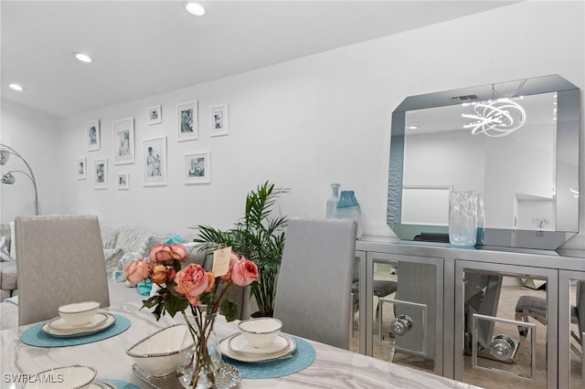 dining area with a chandelier