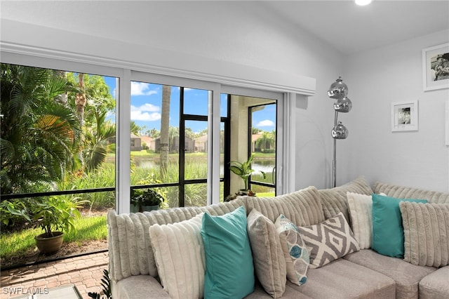 living room with vaulted ceiling