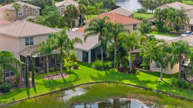 bird's eye view with a water view