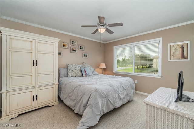 bedroom featuring ceiling fan, ornamental molding, and light carpet