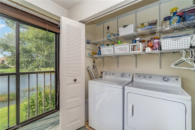 clothes washing area with independent washer and dryer