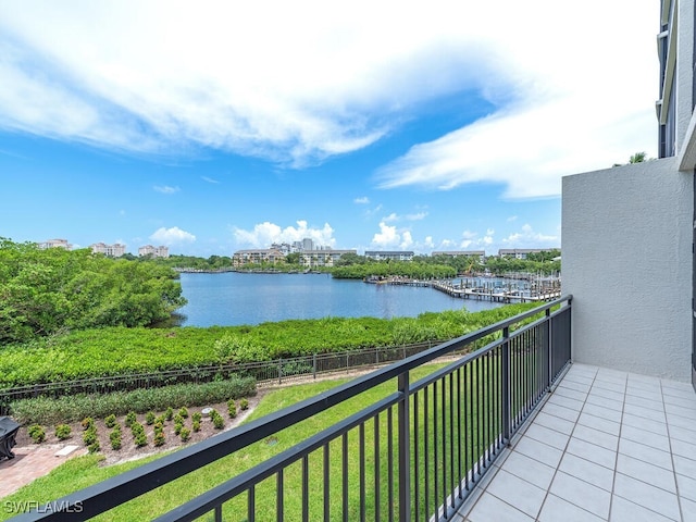 balcony featuring a water view