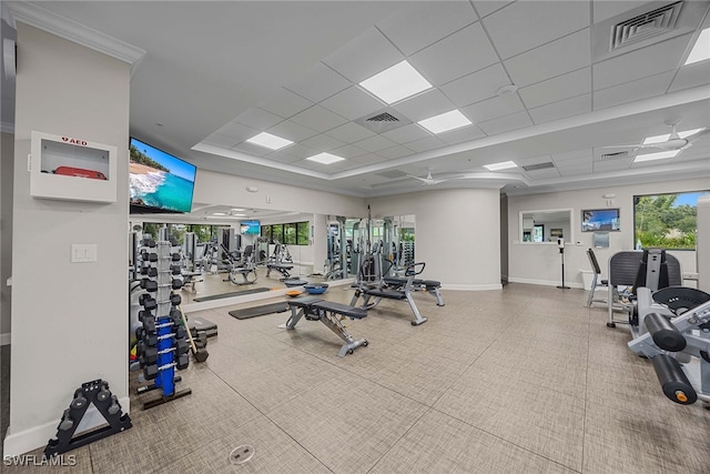 exercise room featuring a paneled ceiling