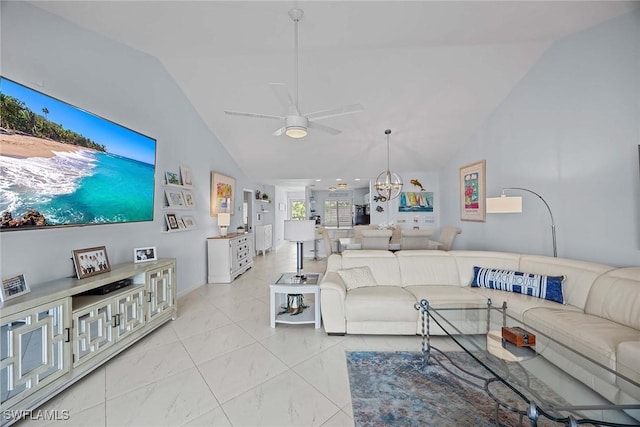 living room featuring vaulted ceiling and ceiling fan with notable chandelier