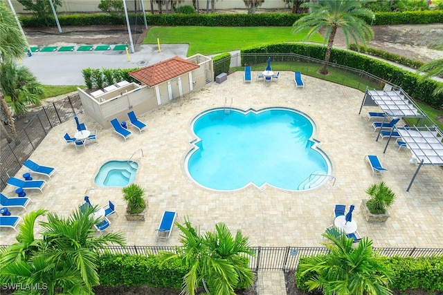 view of pool featuring a patio