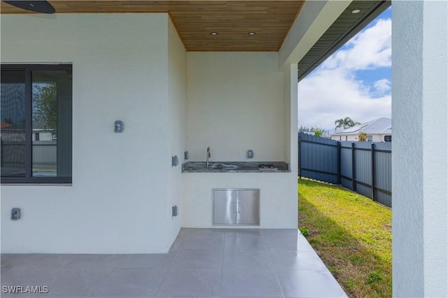 view of patio / terrace with ceiling fan