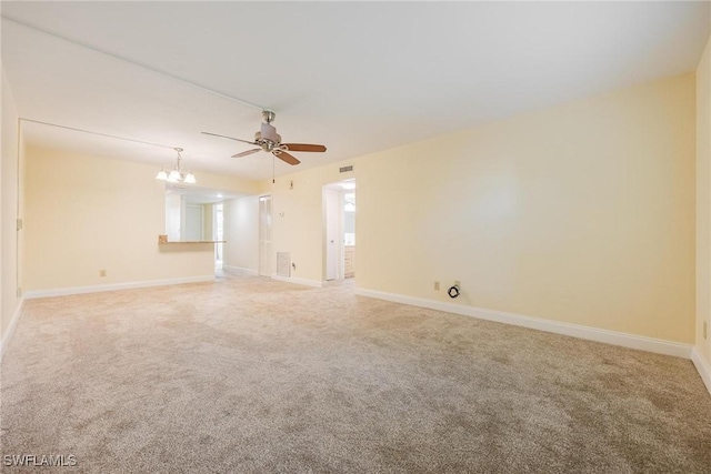 2504 SE 16th Pl Unit 101, Cape Coral, FL 33904 - unfurnished room featuring carpet flooring, a ceiling fan, and baseboards