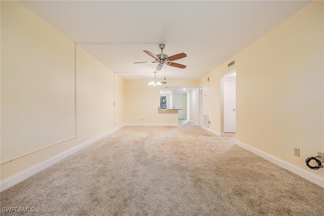 2504 SE 16th Pl Unit 101, Cape Coral, FL 33904 - carpeted empty room with a ceiling fan and baseboards