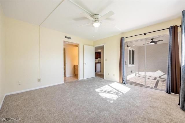 2504 SE 16th Pl Unit 101, Cape Coral, FL 33904 - unfurnished bedroom featuring carpet flooring, baseboards, and a ceiling fan